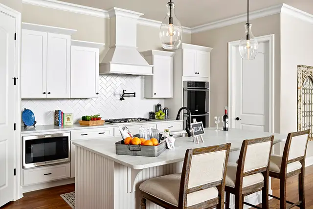 Timberland White Craftsman kitchen with a herringbone backsplash