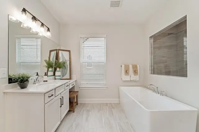 Timberland White raised-panel vanity with a make-up station
